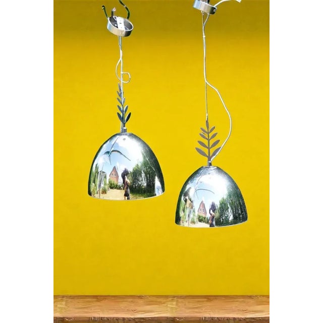 Italian pendant lamp model Festa by Michele de Lucchi & Alberto Nason for Produzione Privata, made of polished metal and...