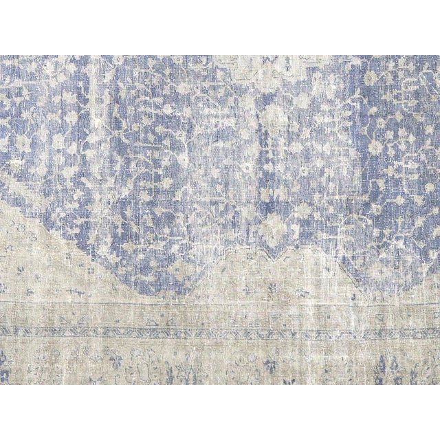 This Semi Antique Turkish Oushak Rug was hand woven in the Oushak region of Western Turkey with wool on wool foundation....