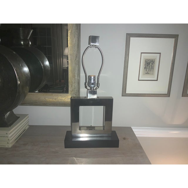 The Doughnut Duncan Table Lamp by Robert Abbey is an abstract, contemporary piece bringing a distinctive style to the...