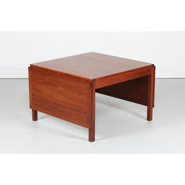 Danish vintage Børge Mogensen extendable coffee table model 5362 made of solid walnut and walnut veneer with oil...