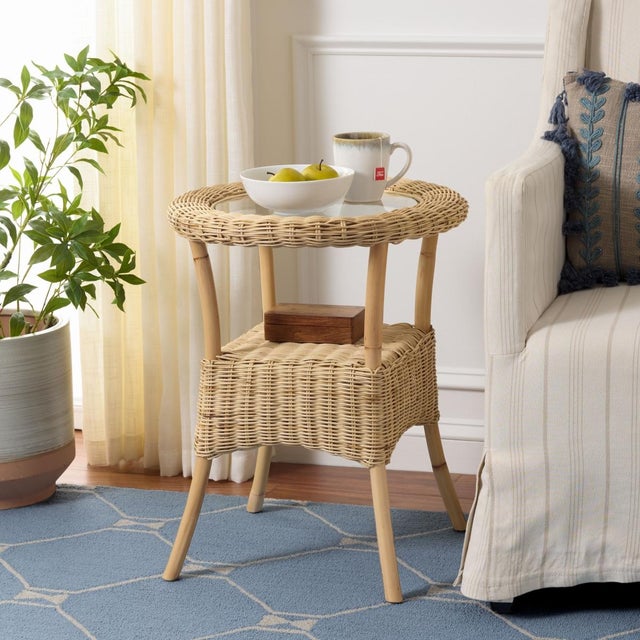 Enhance your living space with the Damary Glass Top Accent Table in Natural and Glass. This elegant piece combines the...