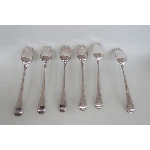 This lovely 6pc Serrated Spork Set is made out of metal and silver plated. The back of each piece is marked towards the...