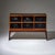 Bar Cabinet standing on two legs with three drawers and a glass top, the middle tor folds down. The interior is completely...