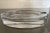 Heavy clear glass oval shaped ashtray with 2 rests. Great addition to coffee table or use for candles/incense.