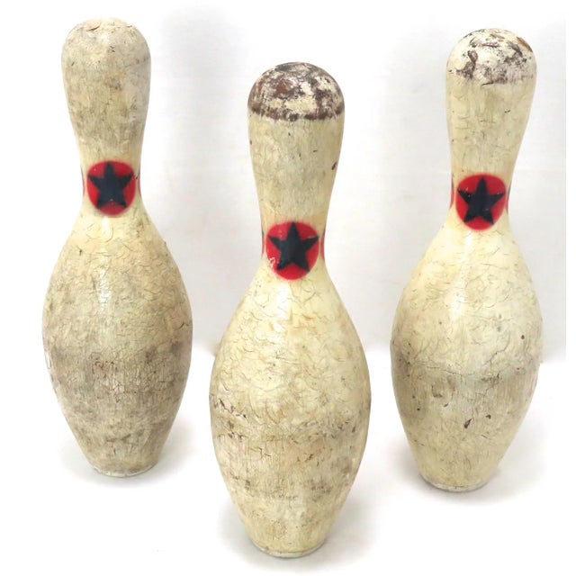 This is a Lot of 3 Original Vintage Mid 20th Century Regulation Size Wood Bowling Pins. American in Origin. They have been...