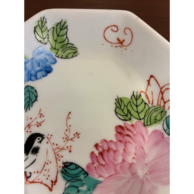 This charming vintage finds dish by F.S. Louie of Berkeley features a delicate hand-painted bird and floral design in...