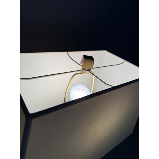 This striking pair of Gregorius Pineo table lamps, sourced from the Holly Hunt showroom in Chicago, showcases the...