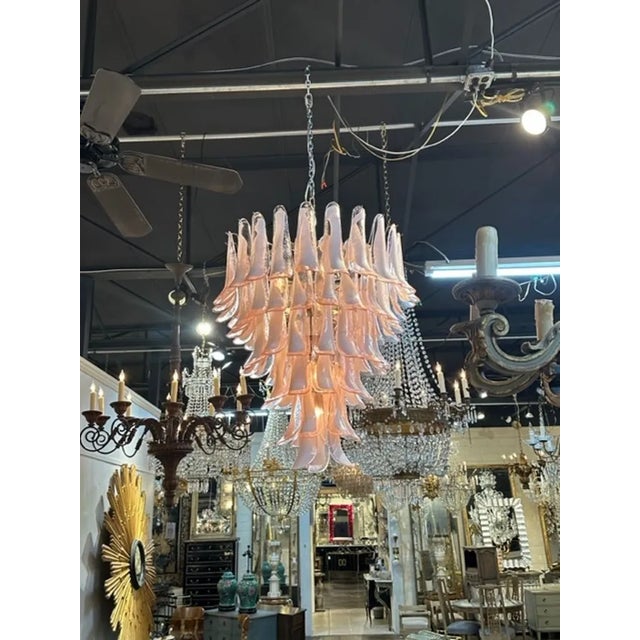 Modern Murano pink and white saddle glass waterfall chandelier. Circa 2000. The chandelier has been professionally...
