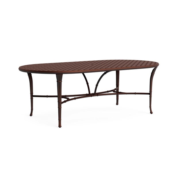 Brown Jordan Calcutta 44" x 86" Oval Cast Umbrella Dining Table in Almandine For Sale
