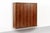 This truly stunning vintage mid century Danish modern rosewood wall-mounted cabinet shelving unit circa 1950 was designed...