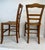 Pair of adorable French Country chairs, these date to around the late 1800's to the early 1900's. They have been...