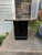 Postmodern Side Tables With Mirror Top & Black Laquered Pedestal Base, Set includes two. In beautiful vintage condition!