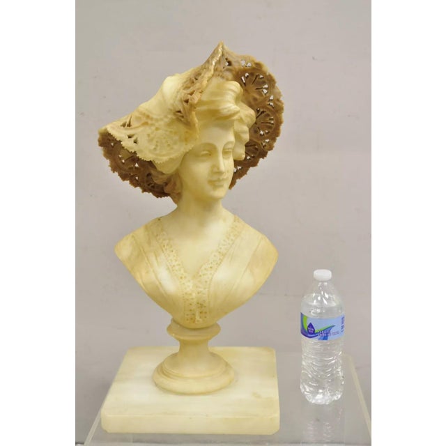Antique Victorian Carved Alabaster Woman Bust Statue attributed to Adolfo Cipriani. Circa Late 19th Century. Measurements:...