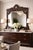 This Moorish style vanity mirror made of solid walnut wood and inlaid with mother-of-pearl. Intricately and finely hand-...