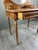 Charming Louis XVI style dressing table in light wood, dating from the late 19th century. It features an elegant oval,...