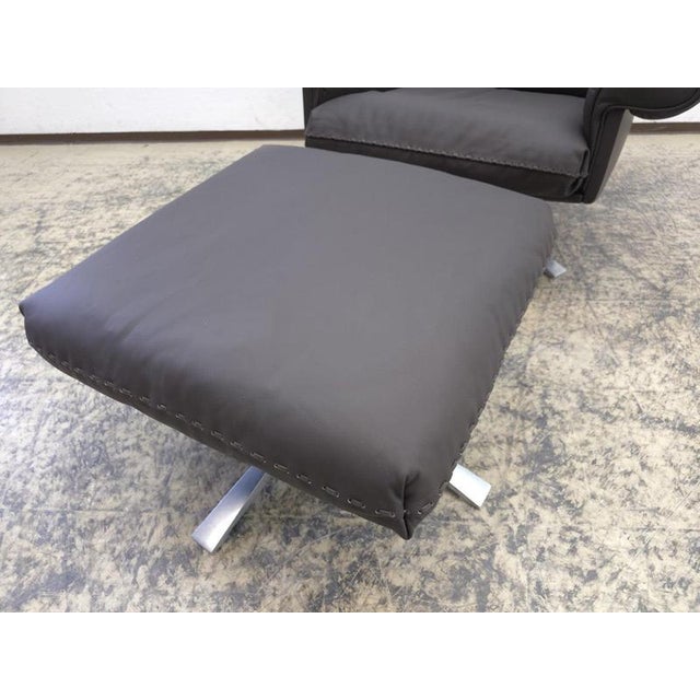 This is a leather armchair with a stool from the company De Sede Model: DS 31 Rocker function with fixation available. The...