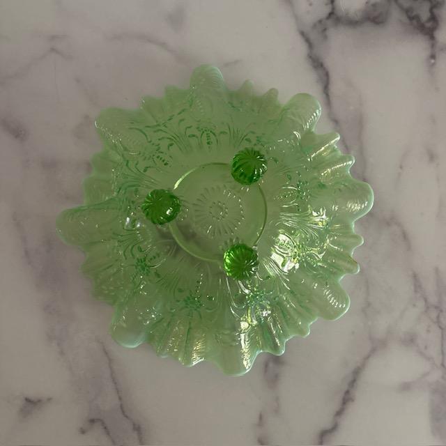Stunning antique Northwood bowl. Green opalescent vaseline glass. Daisy Pearl pattern with ruffled edge. Three glass feet.