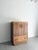 A 1930s limed oak tall boy with wonderful yet simple detailing including curved profiles and a ribbed plinth base. This...