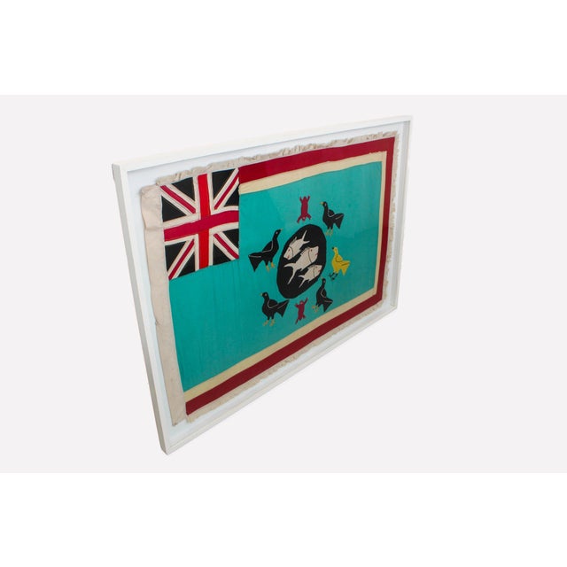 A rare Asafo flag from Ghana, professionally framed and ready to hang as a finished artwork. Hand-appliquéd by Fante...