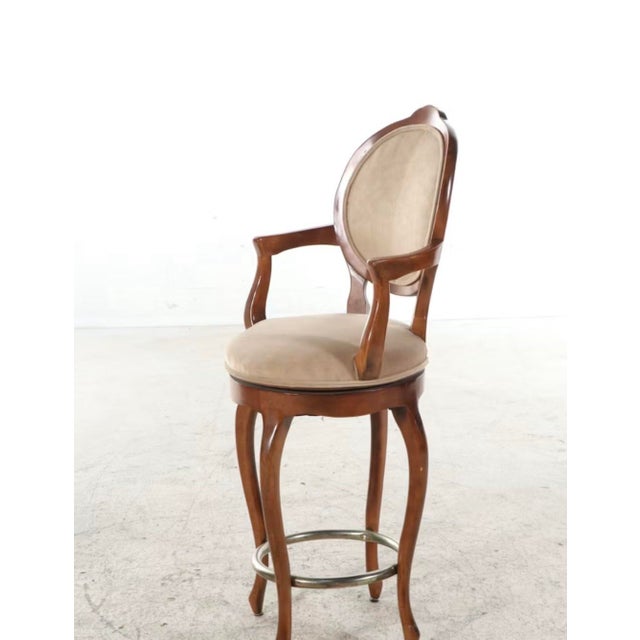 This offering presents a set of three Century Chair Company barstools. These elegant seating pieces showcase a distinctive...