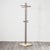 A refined and iconic freestanding coat rack, attributed to the collaboration between renowned designer renato zevi and...