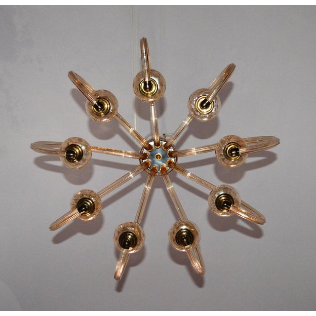 Mid Century Italian Amber Murano Glass Pendant Light (attributed to Venini), a truly unique masterpiece. Its exquisite...