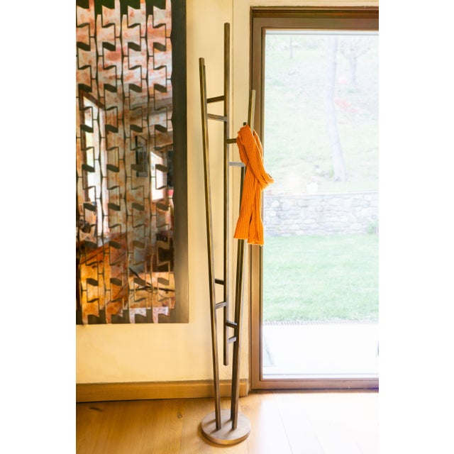 Acrux is a 6-arm floor-standing coat rack made of steel in Italy, characterized by a clean, contemporary design. The...