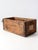 A late 19th century wooden trunk base featuring richly worn surfaces that reflect decades of use and travel. The exposed...