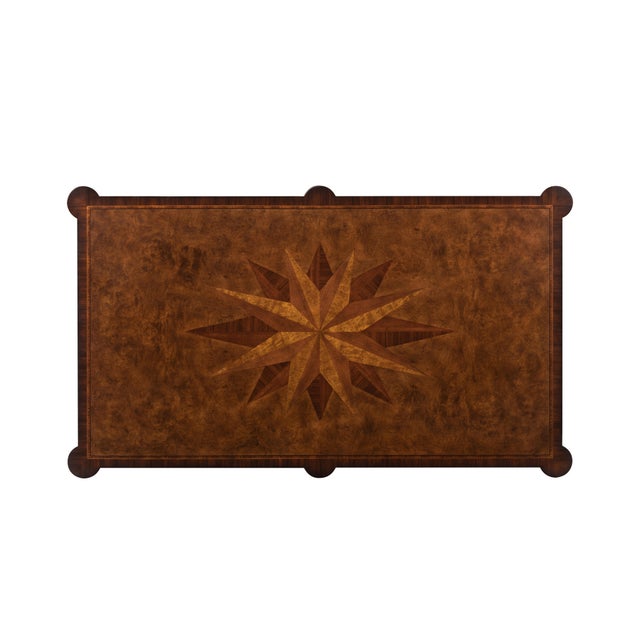 A study in proportion and craftsmanship, this rectangular cocktail table showcases the artistry of hand-matched veneers...