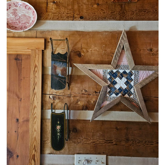 This salesman sample sled features a hand-painted waterfall landscape we believe is attributed to the Paris Manufacturing...