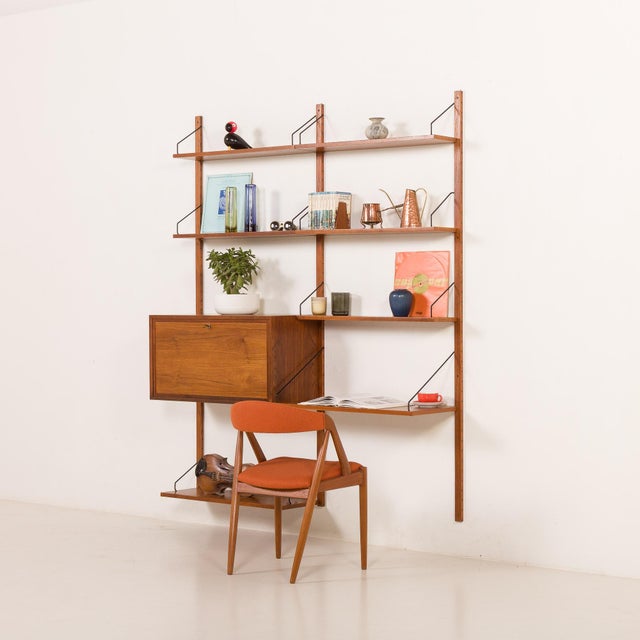 A home office wall unit with a bureau was designed by poul cadovius for cado in the 1960s, and provides discrete working...