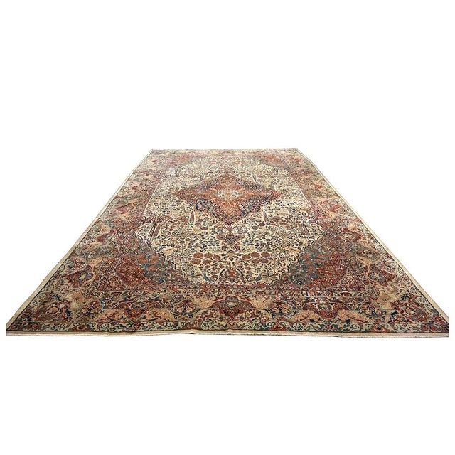 Condition: Antique Circa: 1920s Origin: Persia Design: Sarouk Mahajaran Actual Size: 12'0" X 18'8" Pile Height: 3/8"...