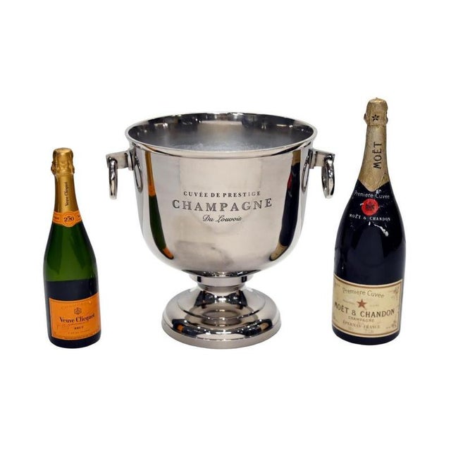 Impressive large silver plated champagne cooler or wine bucket Features a polished finish with decorative Cuvede Prestige...