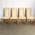 This exquisite set of six Mid-Century dining chairs by American of Martinsville captures the allure of Chinoiserie design...
