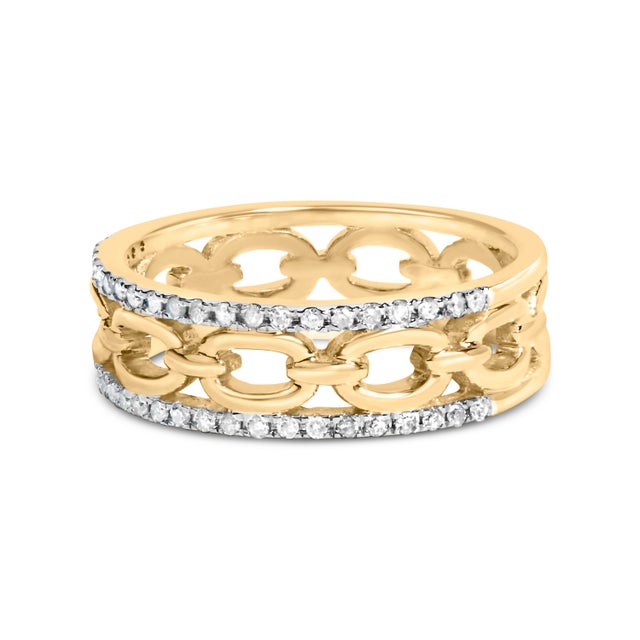 Embrace the allure of sophistication with this exquisite 10K yellow gold ring, beautifully adorned with an enchanting...