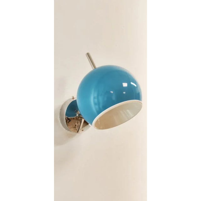Space Age Adjustable Chrome and Light Blue Wall Light, in Very Good conditions. Designed 1970 to 1979 Up to 250V...