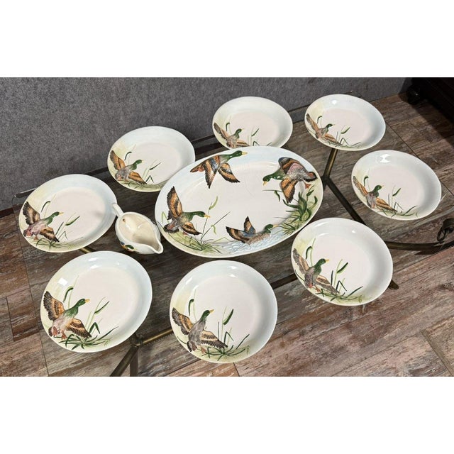 Superb 20th-century porcelain dinner service with embossed ducks, 10 pieces of high quality with beautiful colors. Marked...