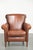 This comfortable sheepskin armchair, with its beautiful colors and sleek finish, features a warm cognac hue and a lovely...