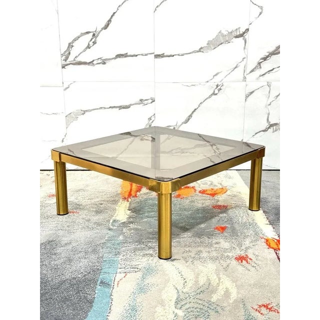 Low Table In Brass And Smoked Glass - Hollywood Regency, 1970s Elegant low living room table in perfect Hollywood Regency...