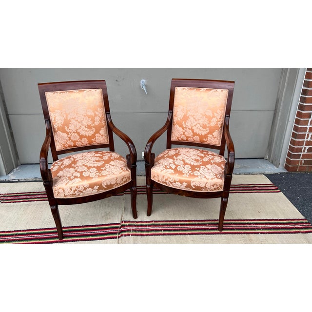 A Very Fine Pair of French Directoire Mahogany Carved Armchairs, Circa 1795 Made in France, circa 1795-1810 Carved arms,...