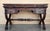 19th Spanish walnut desk or console table with two drawers and strong turning legs and stretcher. Dimensions: Height:...