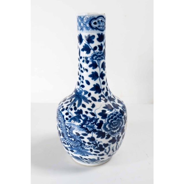 Ceramic 19th Century Chinese Blue and White Bottle Vase With Peony and Dragon, Repaired For Sale - Image 7 of 13