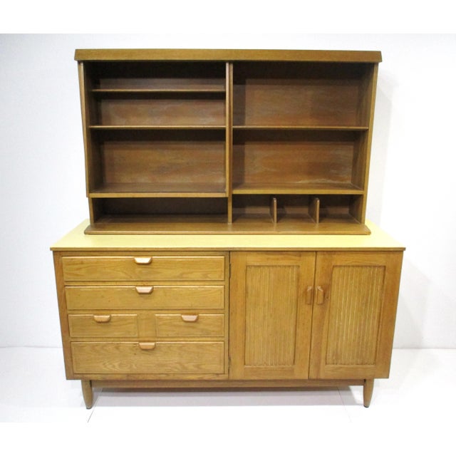 A two piece very well crafted sever / credenza or bookcase with ceruse oak front painted sides and top . Having plenty of...