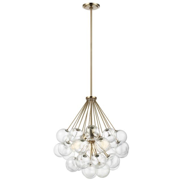 The Bronzeville three light indoor pendant in satin brass supplies ample lighting for your daily needs, while adding a...