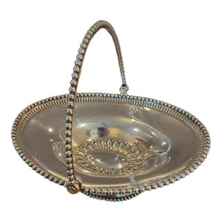 Mid 20th Century Reed and Barton Silverplated Beaded Swing Arm Basket For Sale
