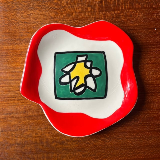 Roland Brice red ceramic plate Abstract design in the center Diameter 23cm Signed on the reverse R. Brice - Biot AM for...