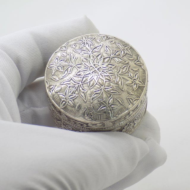 Understated and elegant, this vintage silver trinket box features a classic circular form. Handcrafted in Italy during the...