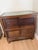 Striking early 20th-century oak and glass mercantile display cabinet or store showcase, dating approximately to the early...
