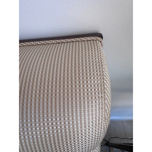 Lucien Rollin Gabrielle Sofa A handsome sofa with Art Deco style. Deep horizontal channel tufts along the back and a dark...