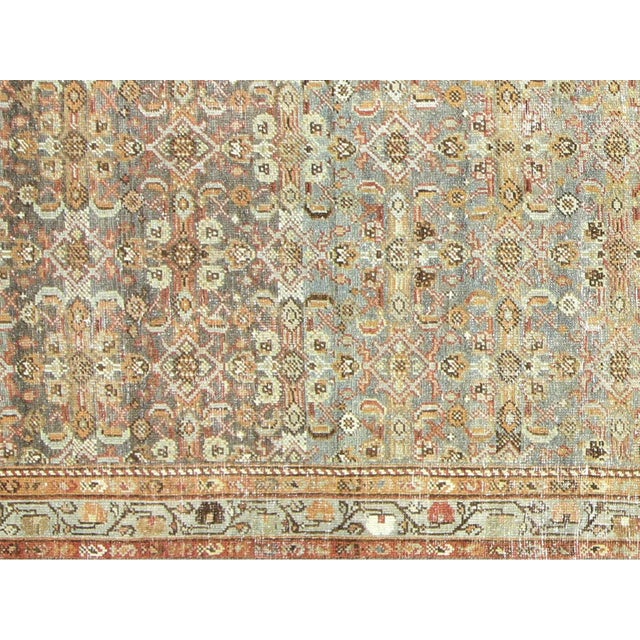 This beautifully hand-knitted Semi Antique Persian Melayer Runner is crafted with an intricate and classic design. With...